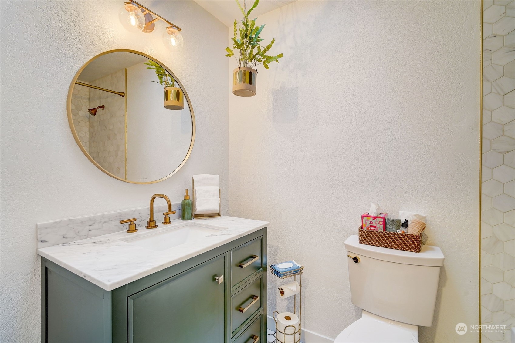 8825 Shell Place Edmonds, WA 98026 - Photo 14 of 40 a bathroom with a sink mirror and toilet