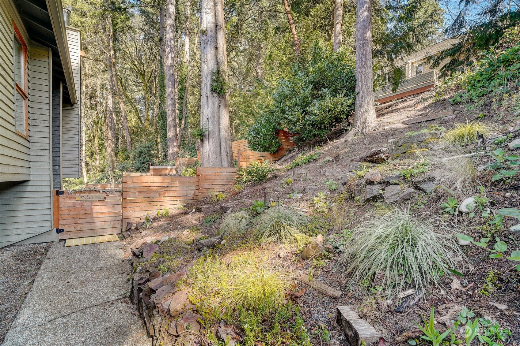 8825 Shell Place Edmonds, WA 98026 - Photo 2 of 40 a view of backyard with patio
