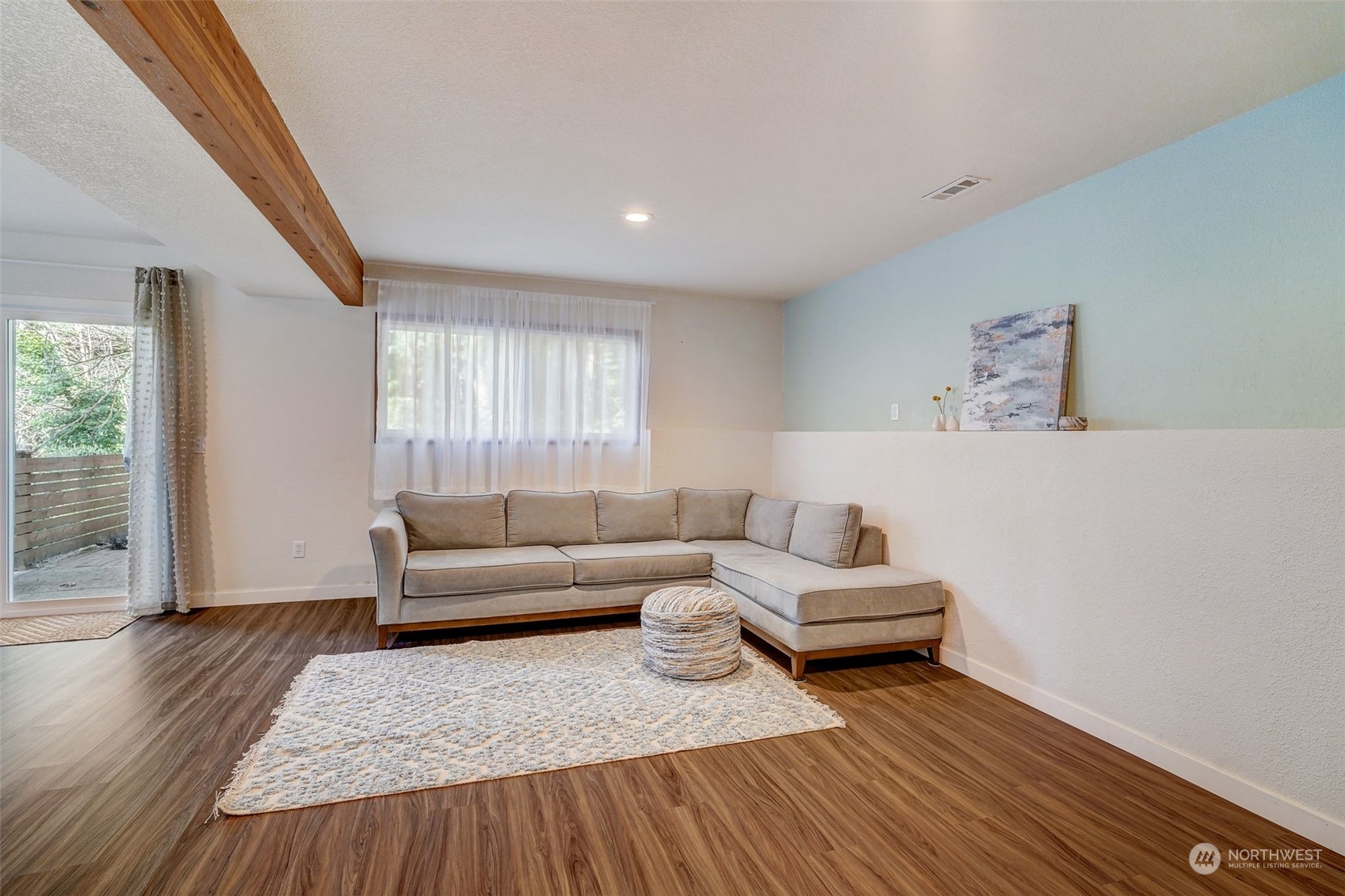 8825 Shell Place Edmonds, WA 98026 - Photo 26 of 40 a living room with furniture and wooden floor