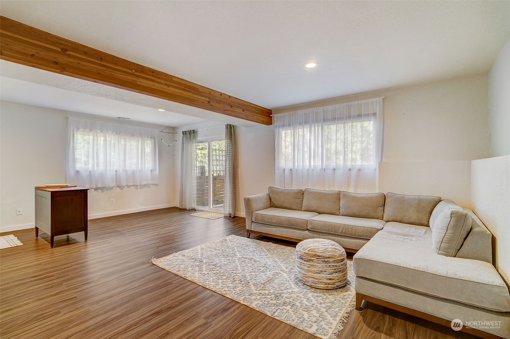 8825 Shell Place Edmonds, WA 98026 - Photo 27 of 40 a living room with furniture and wooden floor
