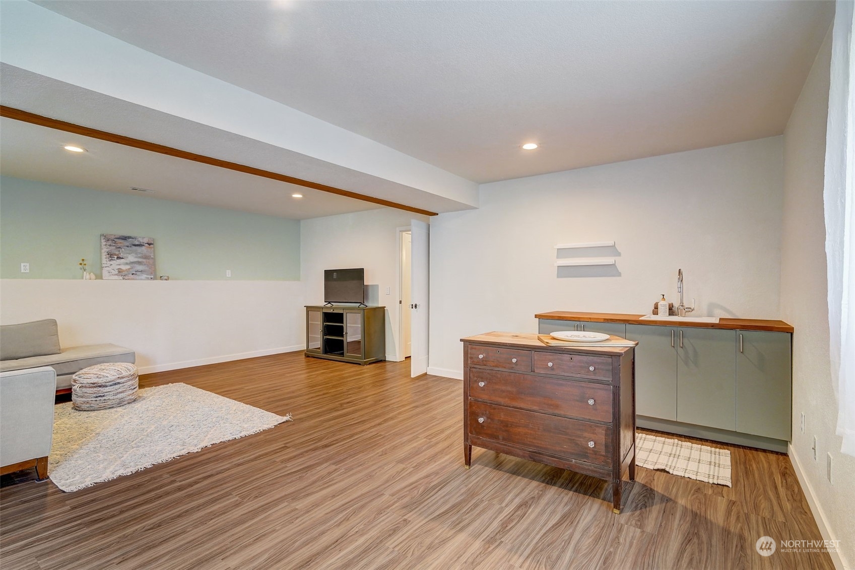 8825 Shell Place Edmonds, WA 98026 - Photo 29 of 40 a living room with furniture and wooden floor