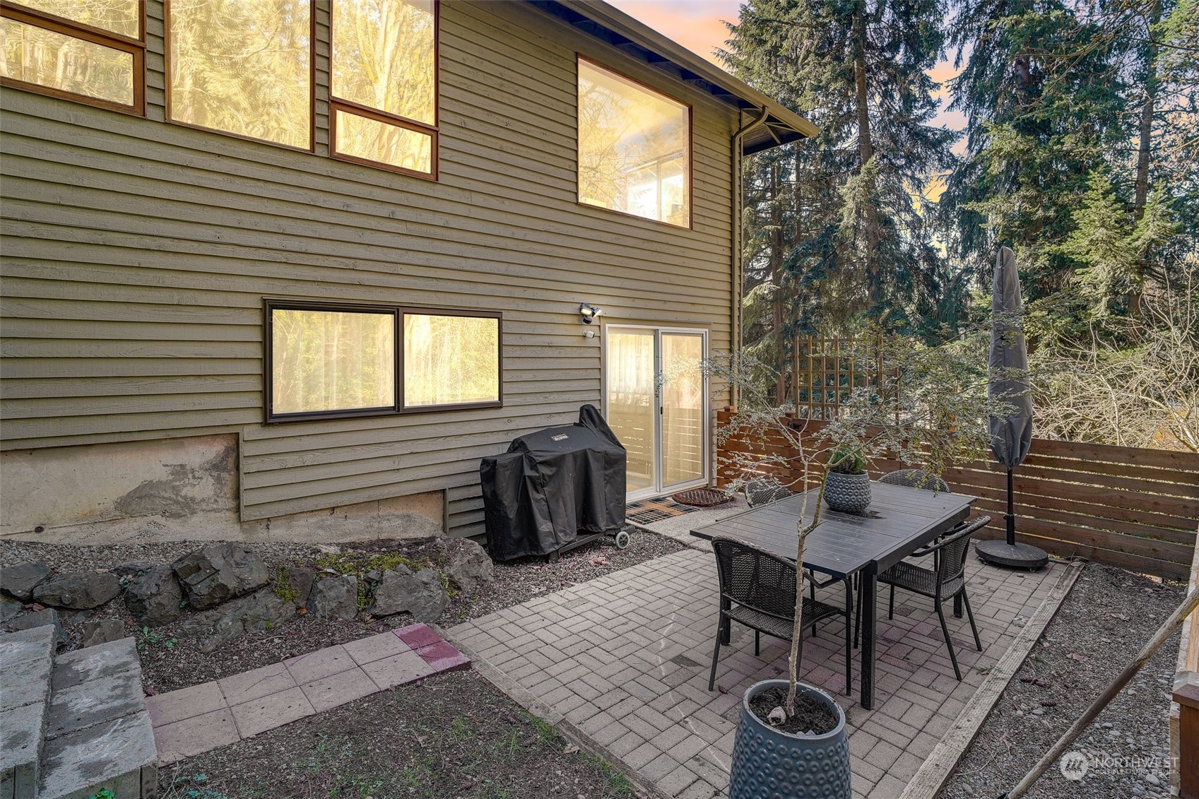 8825 Shell Place Edmonds, WA 98026 - Photo 31 of 40 a backyard of a house with table and chairs