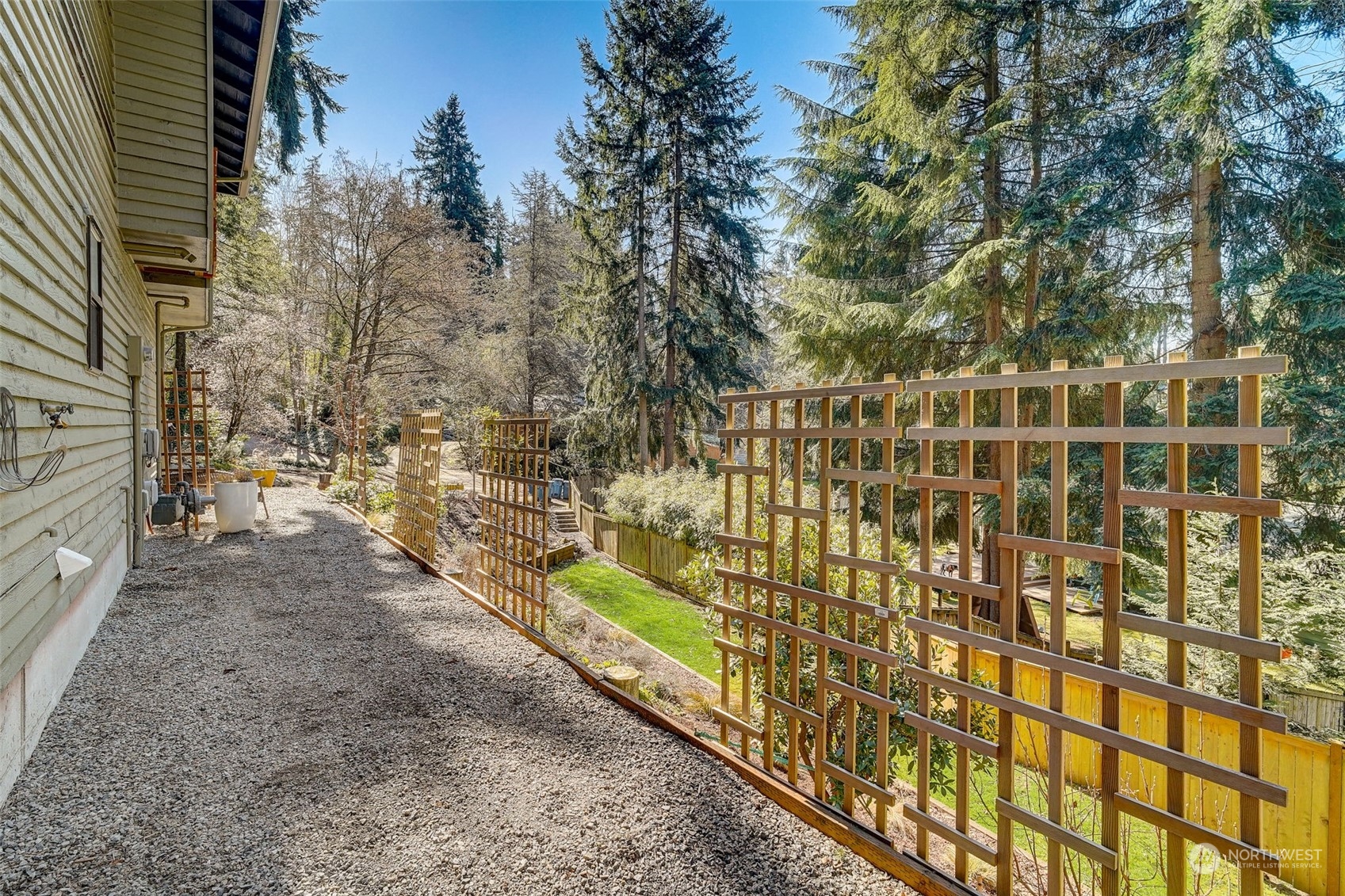 8825 Shell Place Edmonds, WA 98026 - Photo 32 of 40 a view of a pathway with a yard