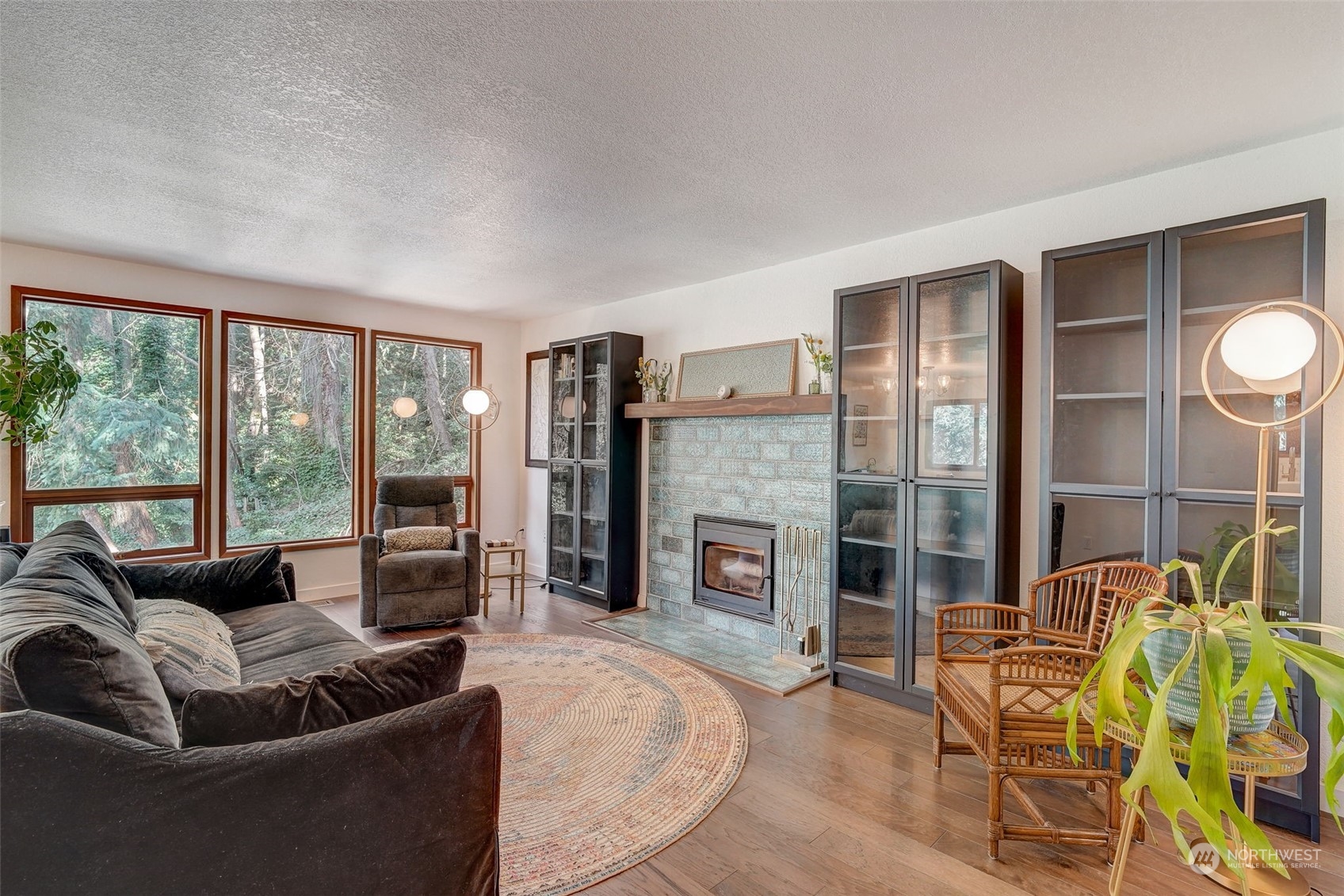 8825 Shell Place Edmonds, WA 98026 - Photo 5 of 40 a living room with furniture and a fireplace