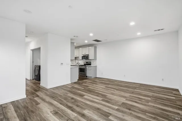 a view of kitchen with wooden floor
