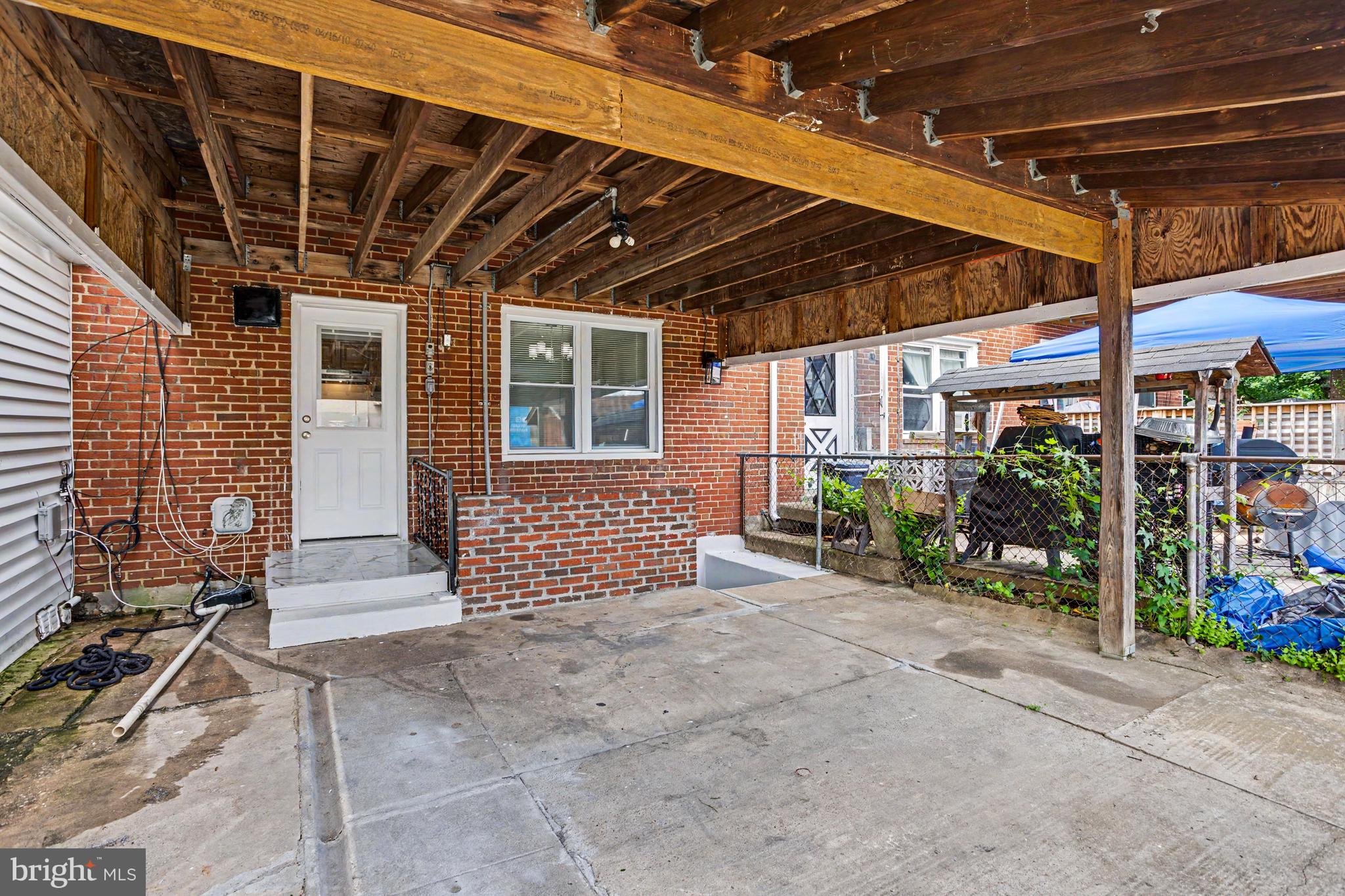 127 Bladen Road Baltimore, MD 21221 - Photo 23 of 31 Large covered patio/parking pad