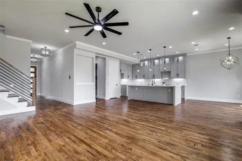 1702 Seevers Avenue Dallas, TX 75216 - Photo 3 of 24 a view of a kitchen with a sink and a large window