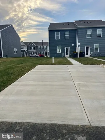 a house view with garden space