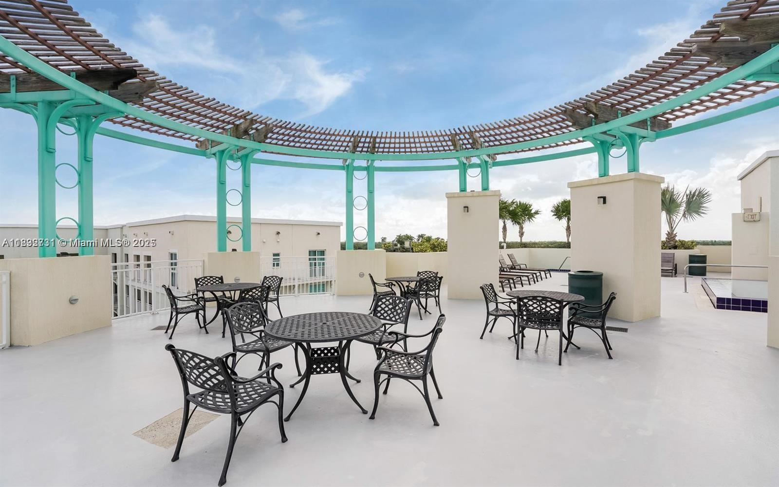 7270 Southwest 88th Street, Unit B502 Miami, FL 33156 - Photo 19 of 20 a dining room with furniture and window
