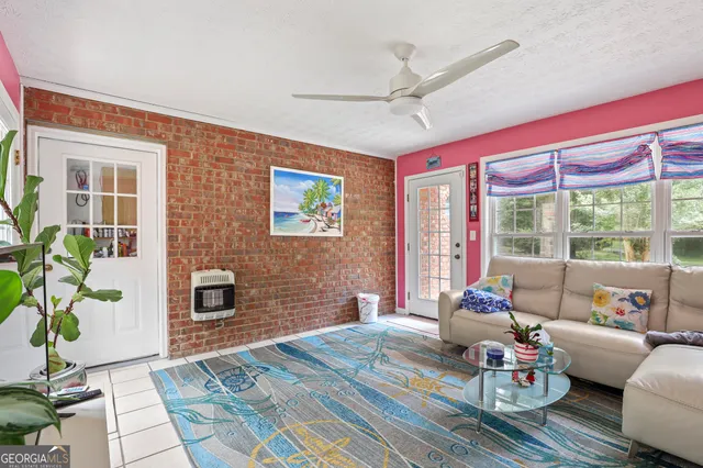 a living room with furniture and a table