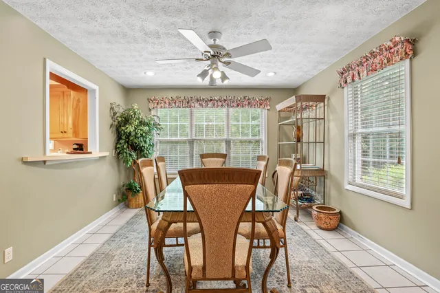 a kitchen with cabinets and stainless steel appliances