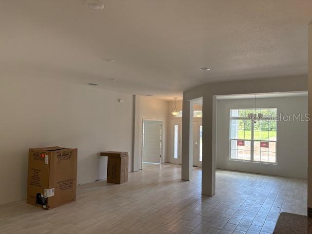 6716 Southwest 179th Ave Road Dunnellon, FL 34432 - Photo 6 of 17 an empty room with windows