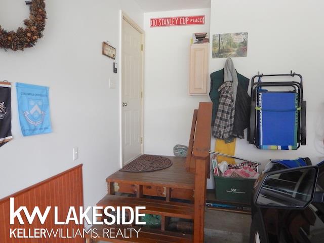 8301 Mist Field Court Howell, MI 48843 - Photo 28 of 34 Access Door inside Attached Garage
