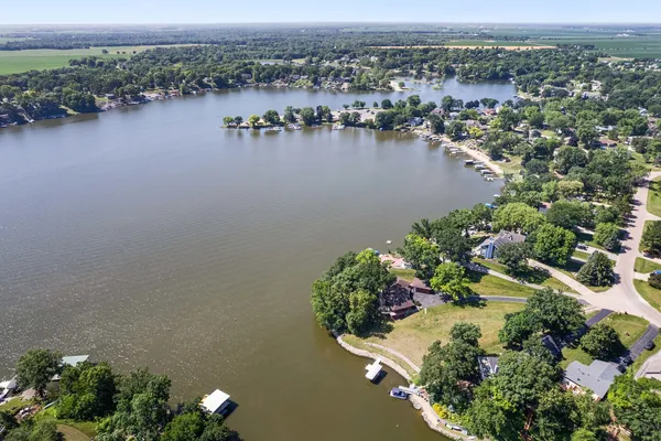 an aerial view of a city with lake view