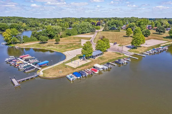 an aerial view of a houses with outdoor space