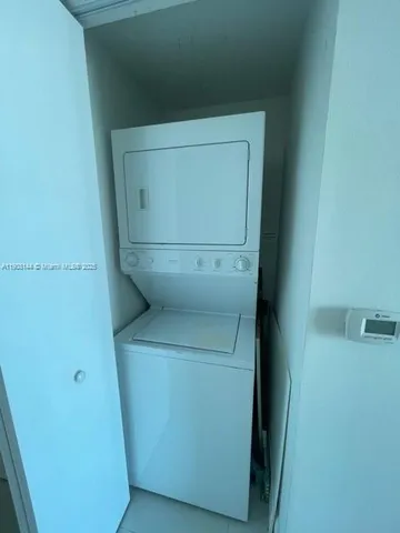 a view of kitchen with outdoor seating and barbeque oven