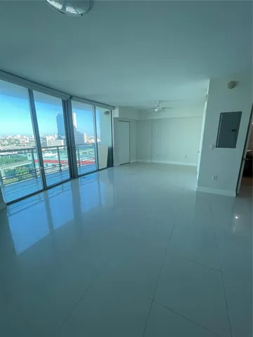 a room with gym equipment and a window