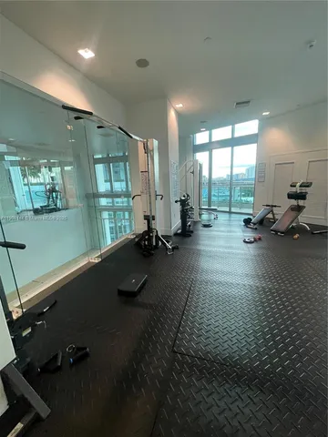a view of a swimming pool with chairs