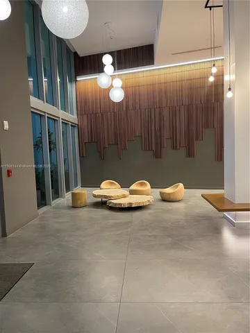a view of a table and chairs in a room