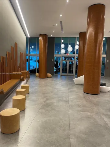 a view of a livingroom with furniture and a furniture