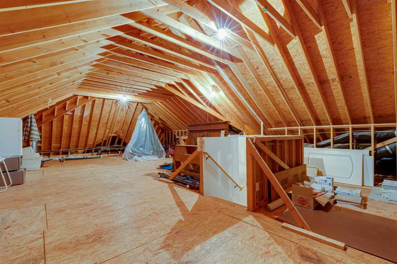 1317 Caistor Lane Raleigh, NC 27614 - Photo 21 of 24 This home has TONS OF STORAGE. This is the walk-up attic - with attic FAN, there is also a walk-in storage room on the 2nd floor and a walk-in storage room in the basement. - and remember it's got a 4 CAR GARAGE! Walk -up Attic