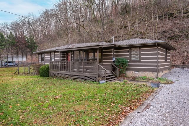 a view of a balcony with wooden floor