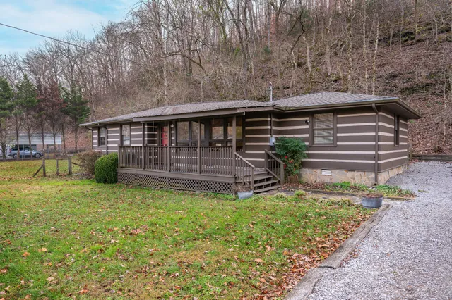 a view of a balcony with wooden floor