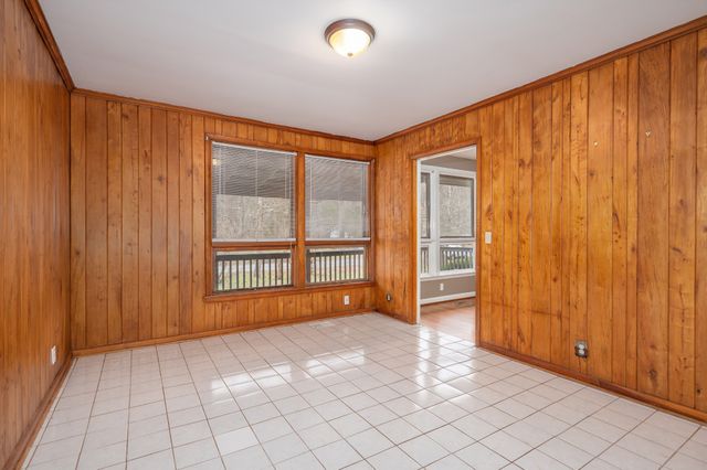 a kitchen with a stove a sink and a refrigerator