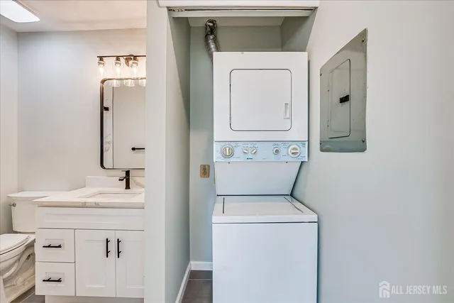 a utility room with dryer and washer