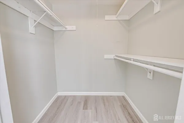 a view of a room with racks on the wall