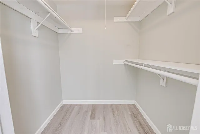 a view of a room with racks on the wall