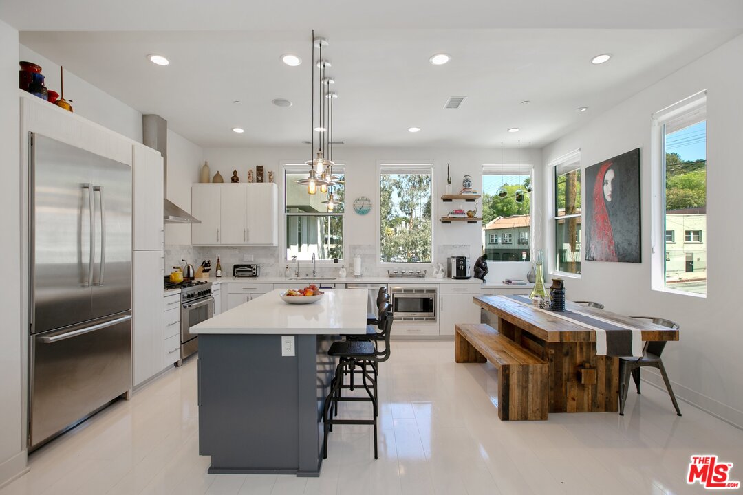a kitchen with counter top space appliances and a counter top space