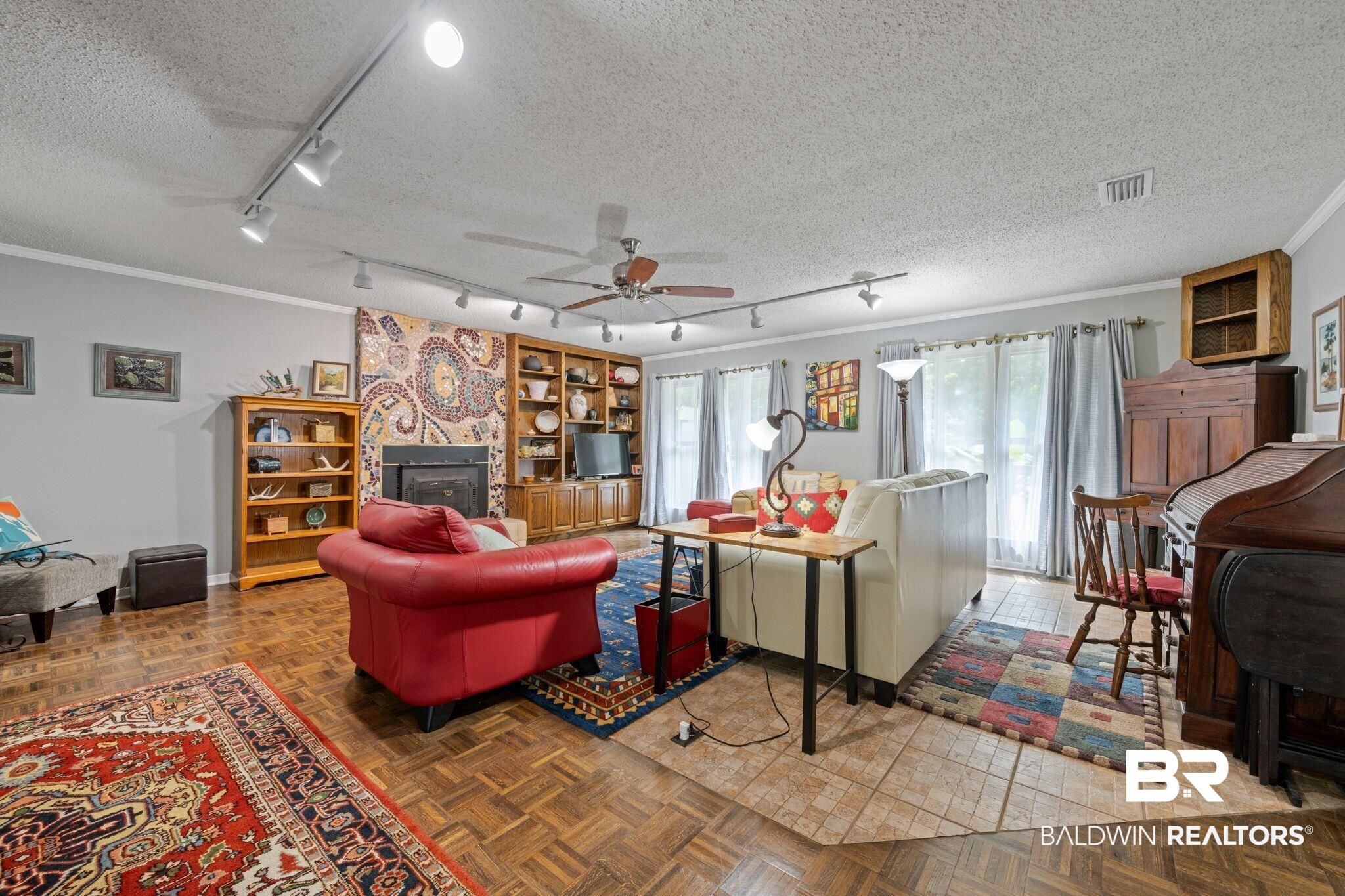 40 Caisson Trace Daphne, AL 36527 - Photo 7 of 54 Living room featuring parquet floors, a wealth of natural light.