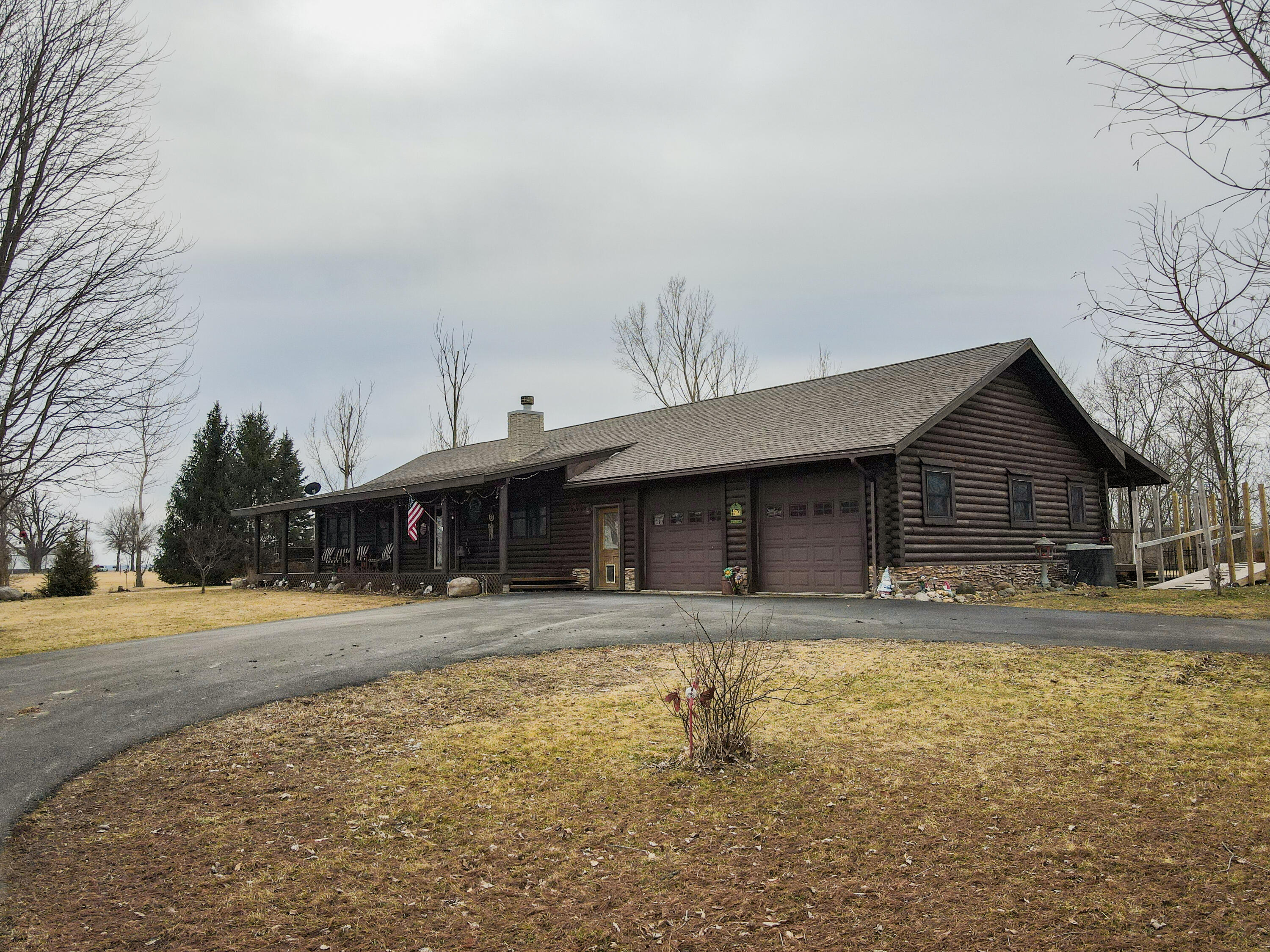 7523 West 850th Street South Rensselaer, IN 47978 - Photo 1 of 39 a front view of a house with a yard