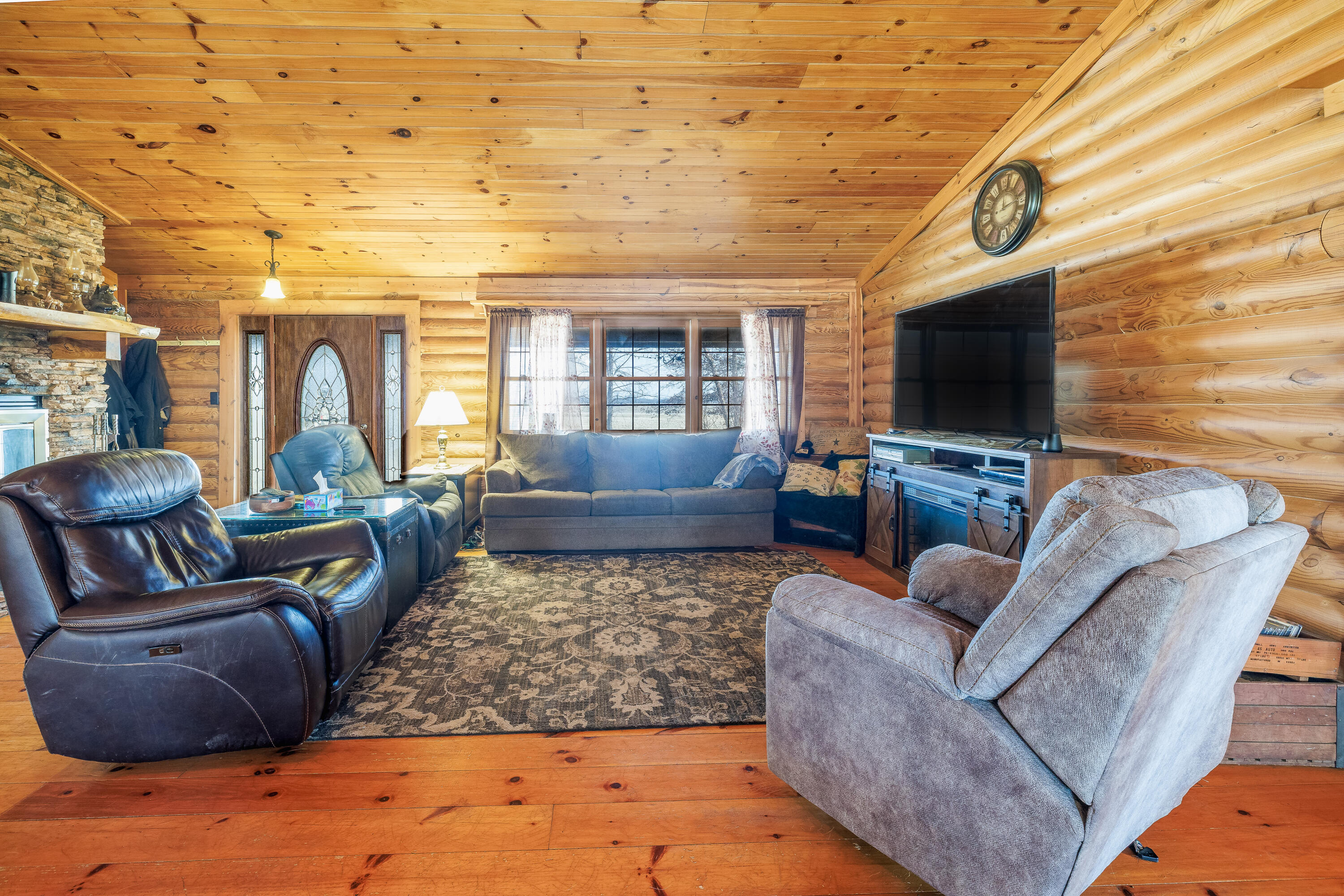 7523 West 850th Street South Rensselaer, IN 47978 - Photo 20 of 39 a living room with furniture and a flat screen tv