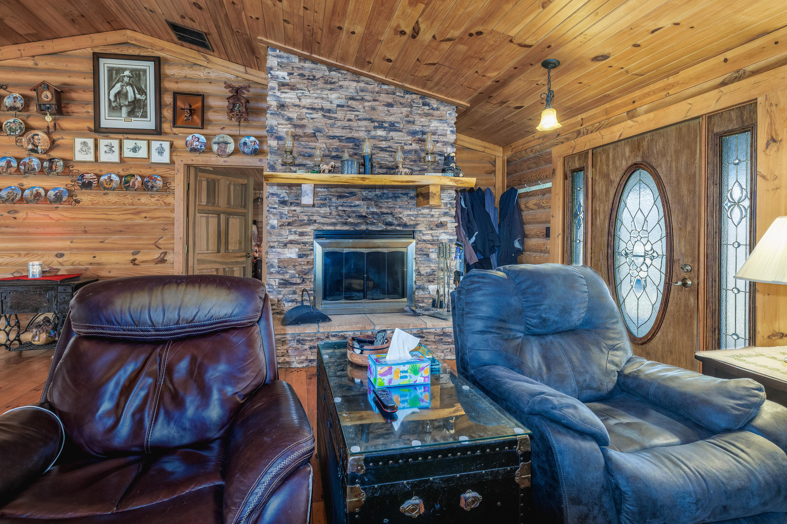 7523 West 850th Street South Rensselaer, IN 47978 - Photo 21 of 39 a living room with furniture and a fireplace