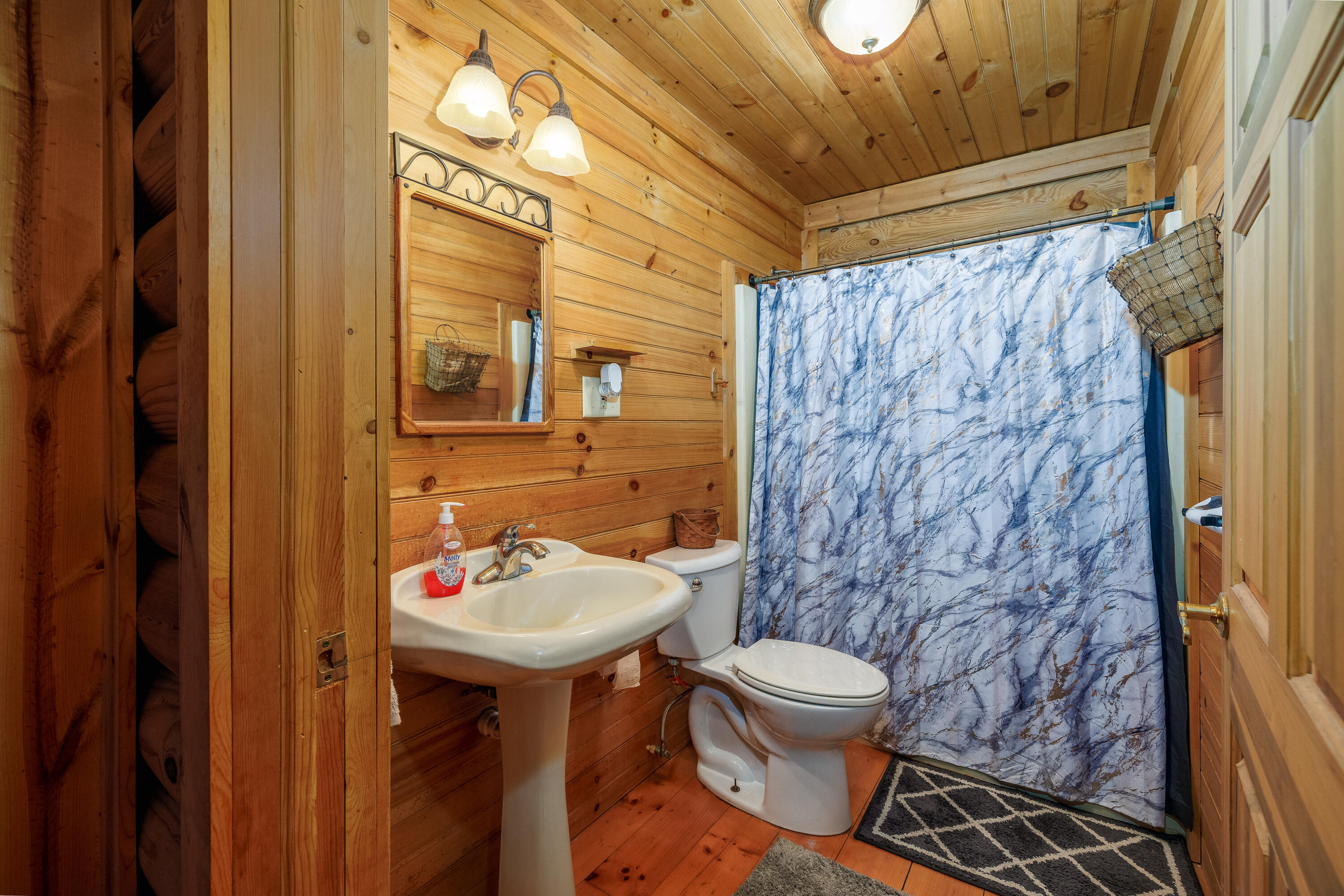 7523 West 850th Street South Rensselaer, IN 47978 - Photo 35 of 39 a bathroom with a sink and a mirror