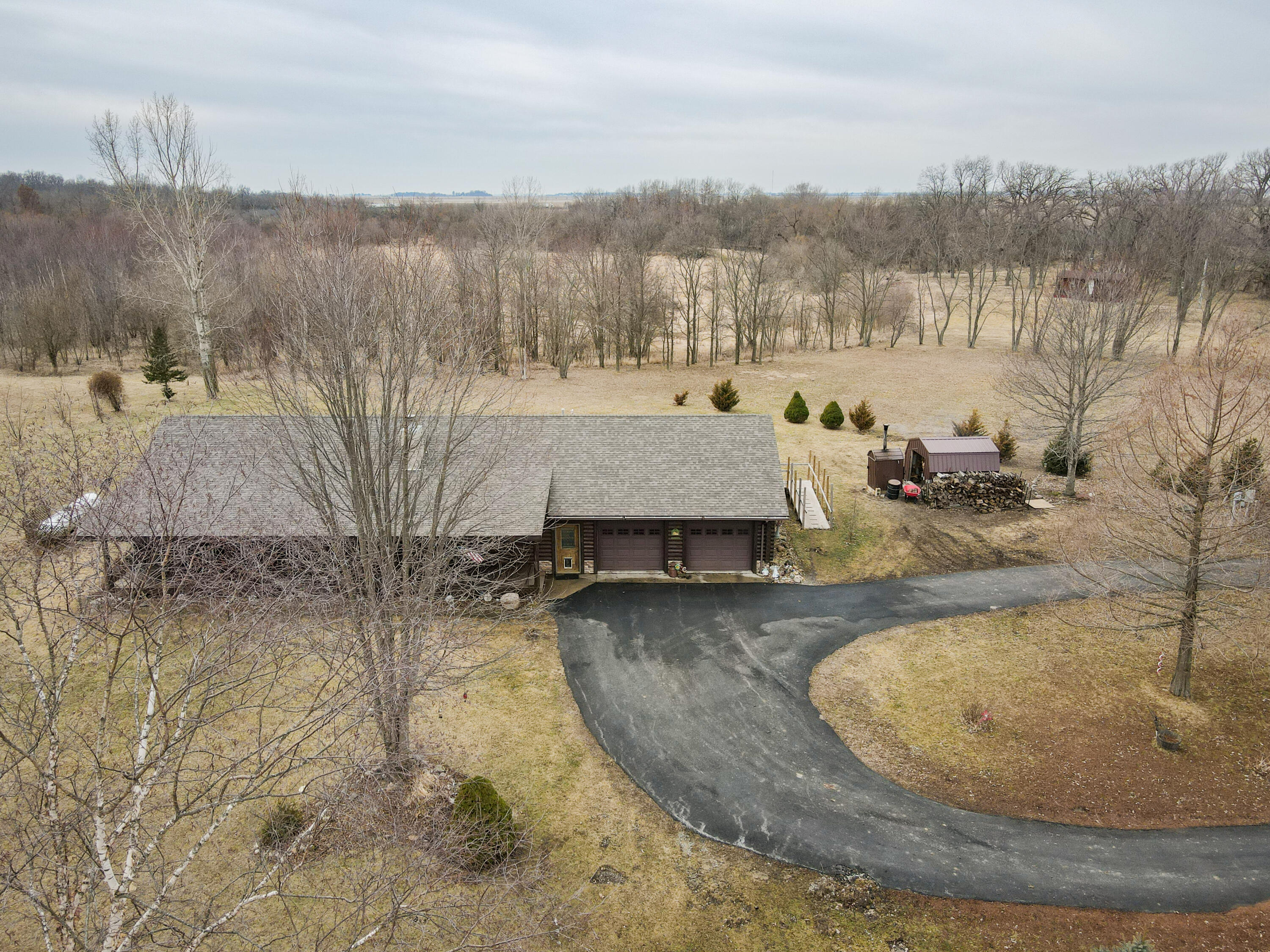 7523 West 850th Street South Rensselaer, IN 47978 - Photo 10 of 39 an aerial view of a house with a yard and large tree