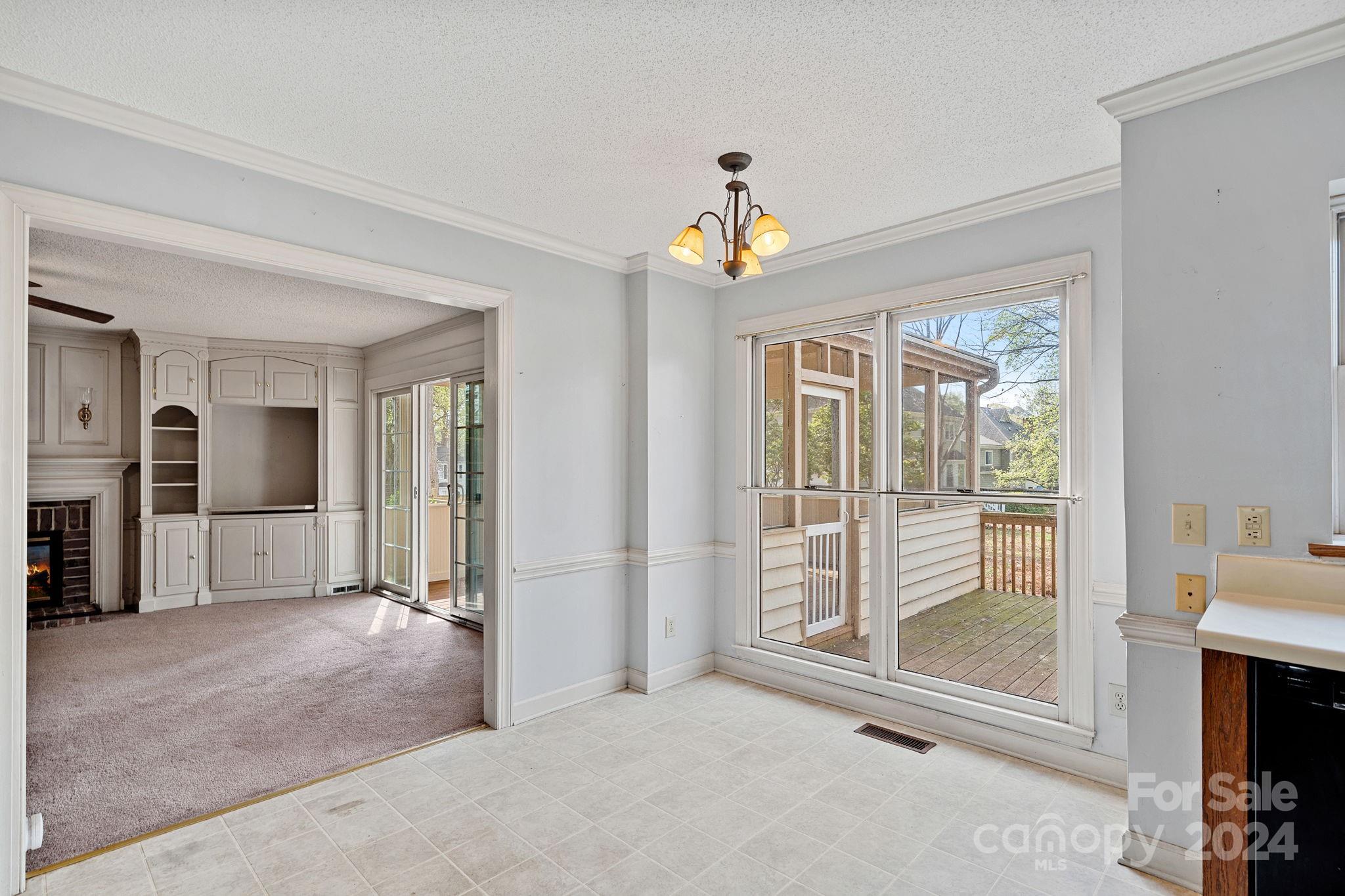 12516 Hawks Ridge Road Huntersville, NC 28078 - Photo 9 of 36 wooden floor in an empty room with a window