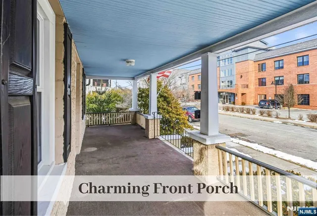 a view of a floor to ceiling window and an outdoor view