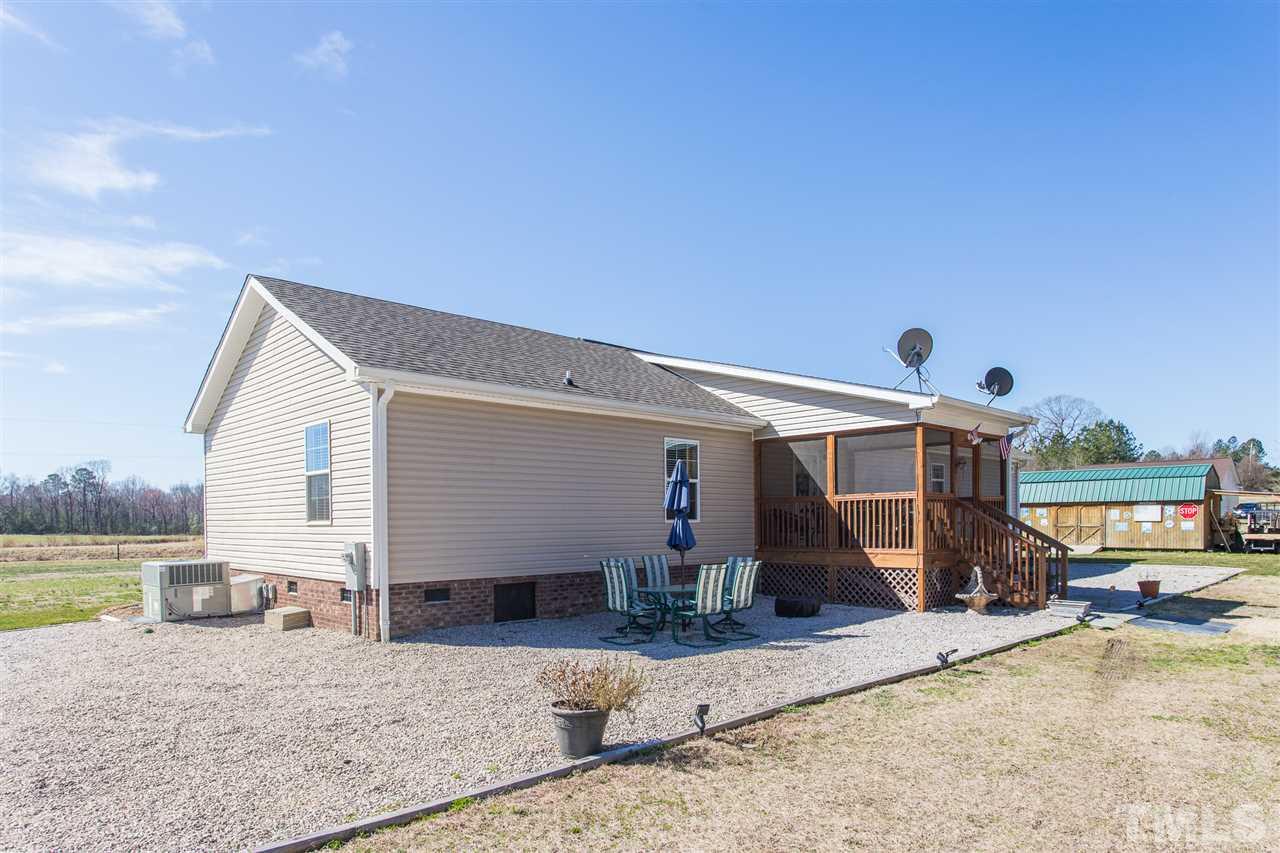 3374 Prophecy Road Middlesex, NC 27557 - Photo 3 of 21 Enjoy outdoor BBQs with a huge patio and screened in porch!
