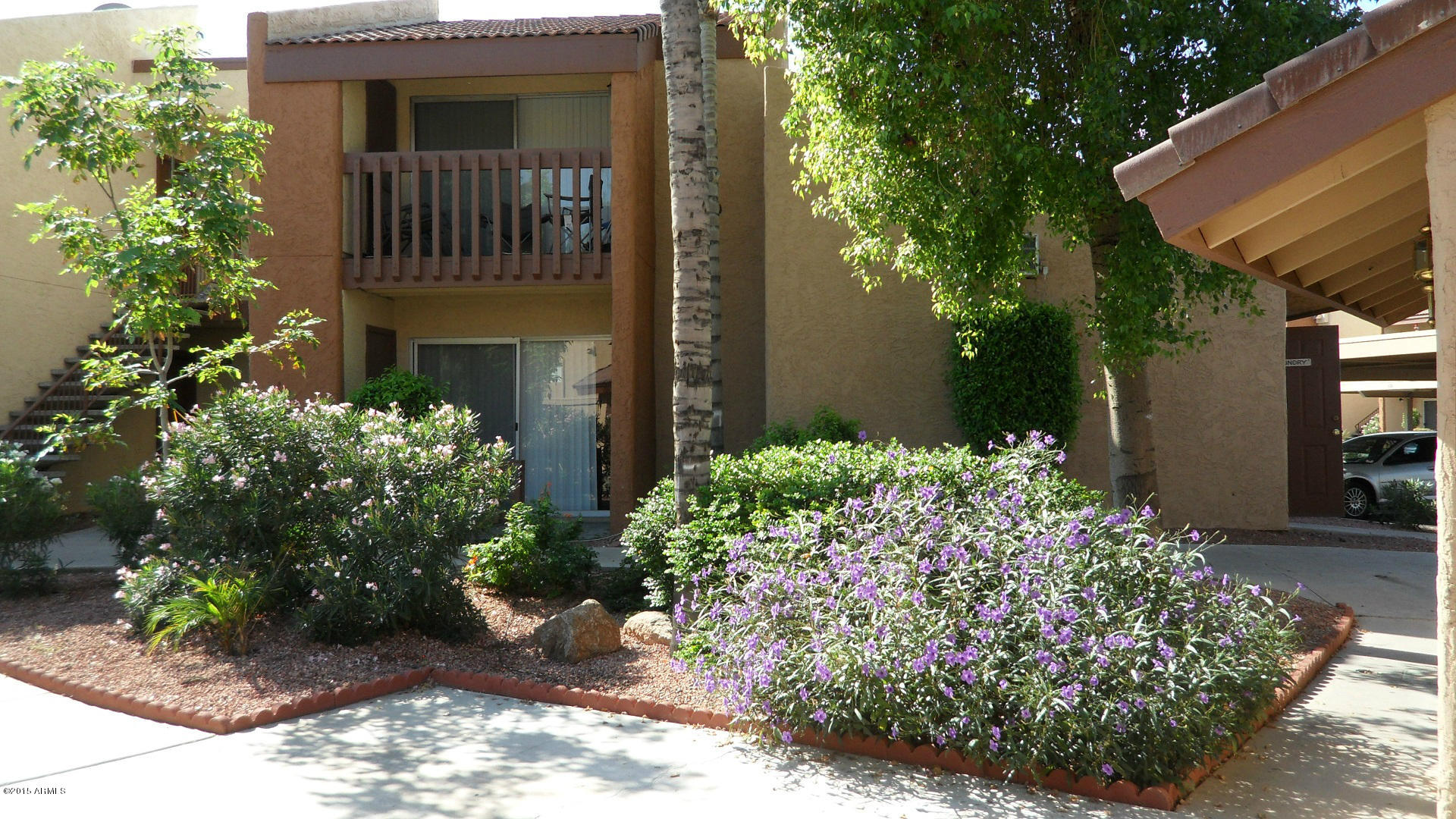 2121 West Royal Palm Road, Unit 2099 Phoenix, AZ 85021 - Photo 2 of 11 Complex - flowers