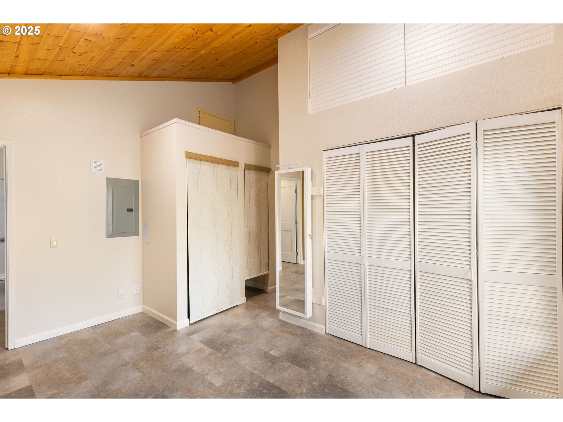 7734 Southwest Barnes Road, Unit A Portland, OR 97225 - Photo 17 of 37 Primary Bedroom