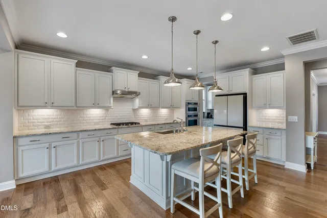 $845,000 | 105 Mystic Quartz Lane, Holly Springs, NC 27540