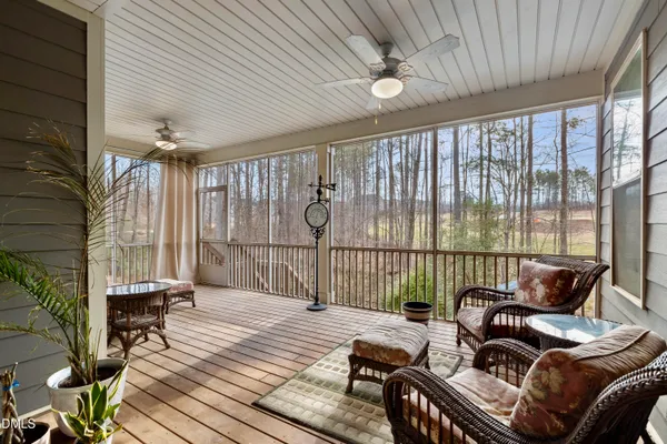 a balcony with furniture