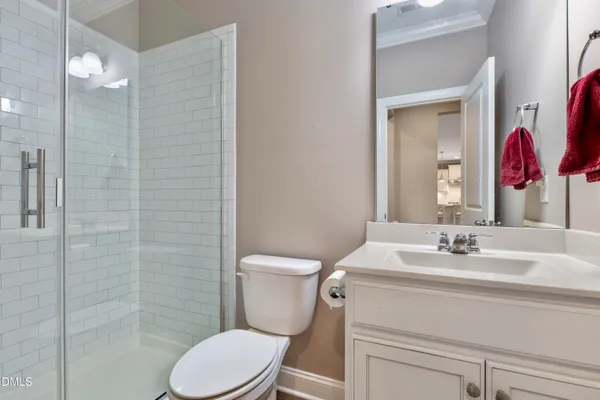 a view of staircase with white walls and stairs