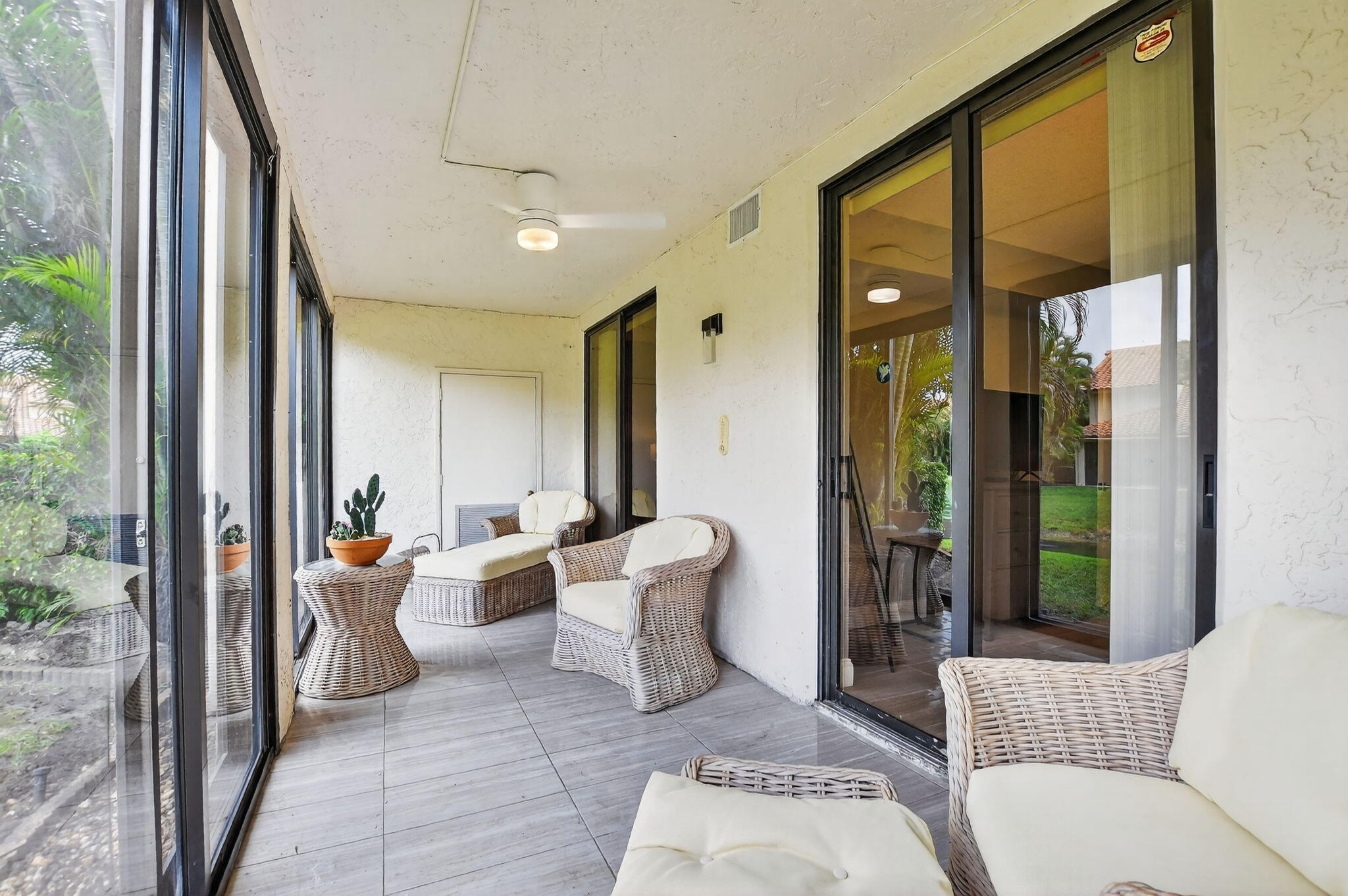 7773 La Mirada Drive Boca Raton, FL 33433 - Photo 31 of 39 Enclosed patio