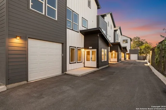 a view of a house with a street