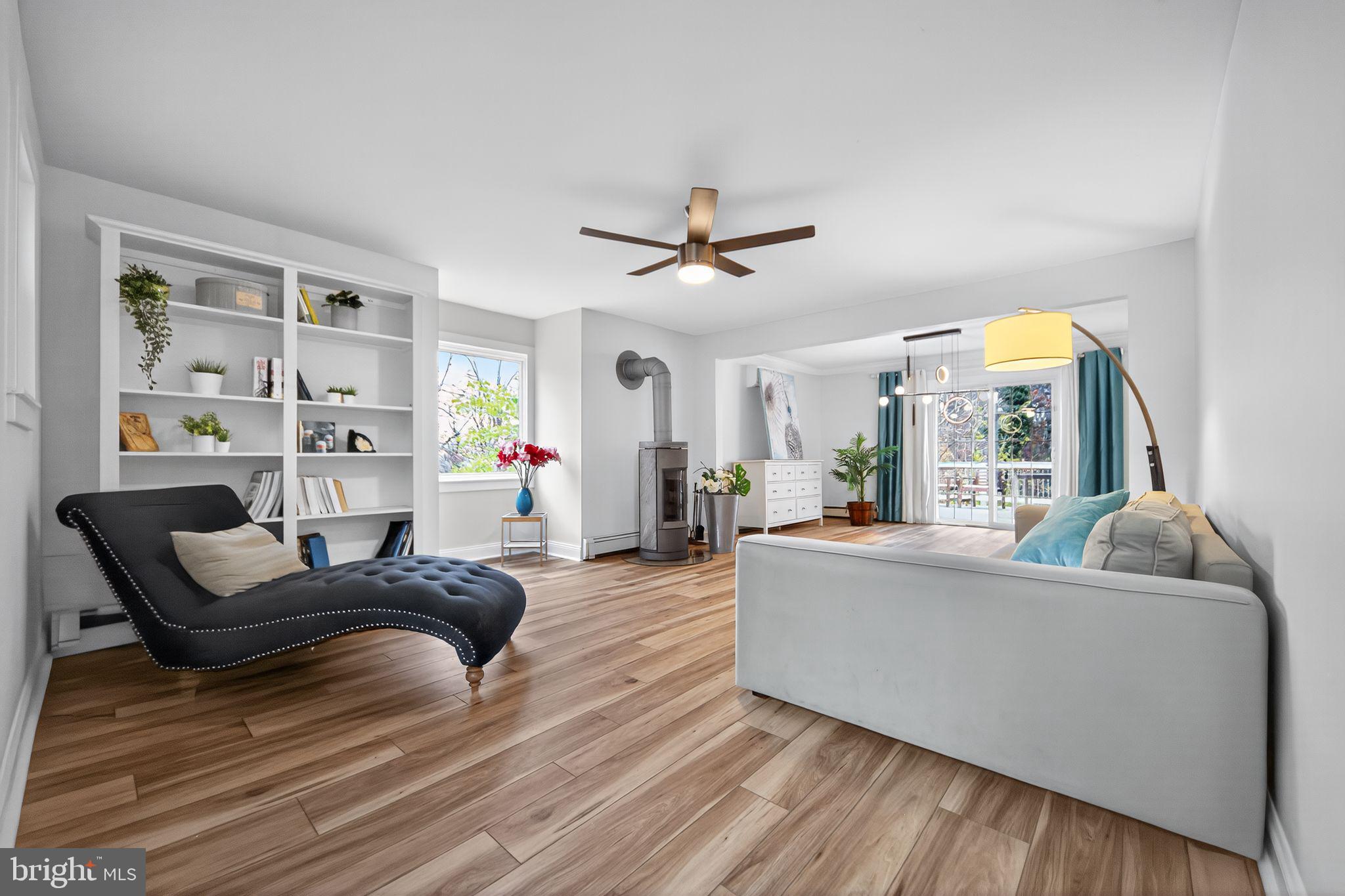 575 West Valley Road Wayne, PA 19087 - Photo 4 of 36 a living room with furniture and a large window