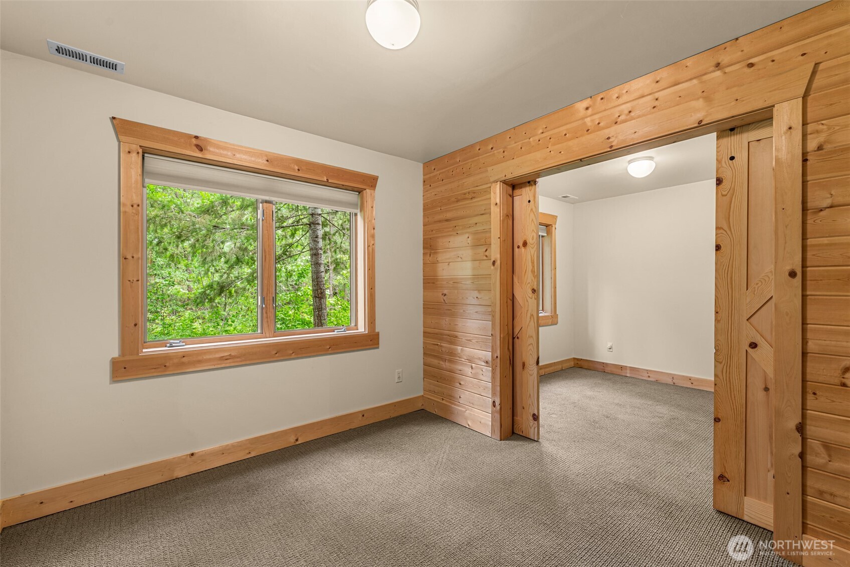 3888 Camas Creek Road Peshastin, WA 98847 - Photo 34 of 40 an empty room with windows and closet